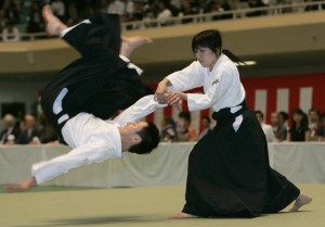 Japanese martial art Aikido demonstrators perform during the 45th All Japan Aikido Demonstration in Tokyo May 26, 2007. REUTERS/Kim Kyung-Hoon (JAPAN)